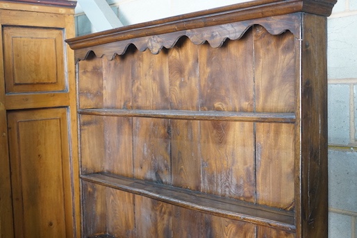 An 18th century style elm pot board dresser with boarded rack, length 132cm, depth 39cm, height 187cm